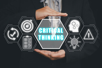 Critical thinking concept, Business person hand holding critical thinking icon on virtual screen,...