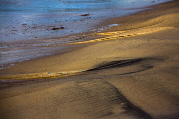 Creative beach sand with small stones