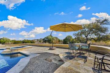 Home pool with patio