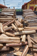 Closeup of pile of trunks of felled trees in countryside of Brazil