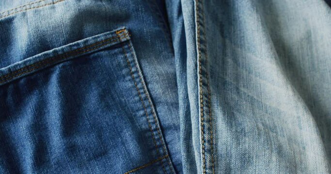 Close up of jeans with different shades with copy space