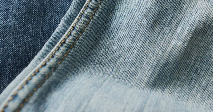 Close up of jeans with different shades with copy space