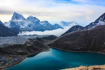 A lake in the mountains of India at dawn. View from above