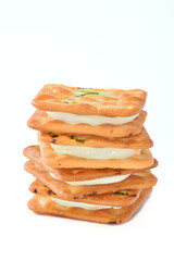 Scallion cookie nougats on white background 