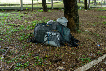 Pile of garbage in white bag.