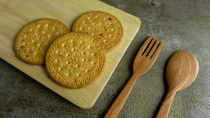 butter biscuits on wooden cutting board