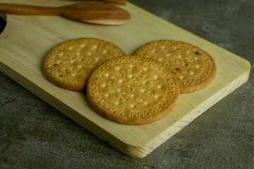 butter biscuits on wooden cutting board