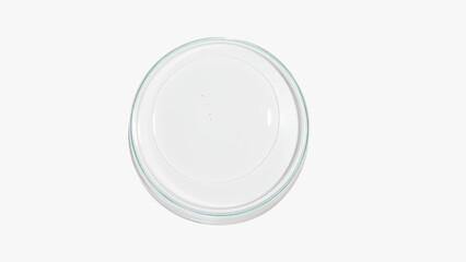 Petri dish with transparent color gel on a light background. Glassware. Liquid. Study.