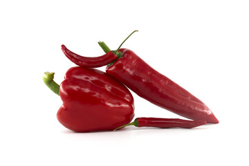 Red chili peppers and bell pepper isolated on white