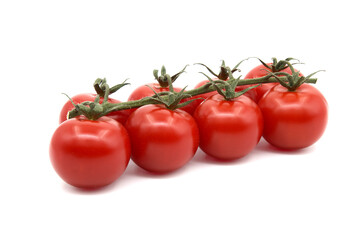 Cherry tomatoes twig isolated on white