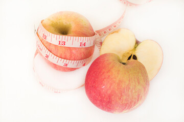 fresh healthy foods apples health care for diet with tape waist arrangement flat lay style on background white 