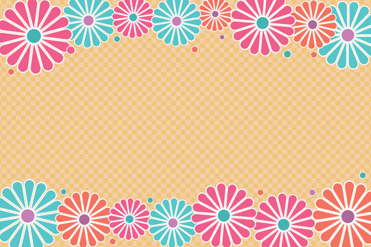 Orange checkered background with pink and blue flowers frame and copy space