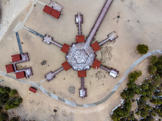 Aerial view landscape. Wind rose, vagrant desert, trees and sand, object , building.