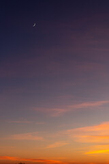 Sunset sky with pink and gray clouds