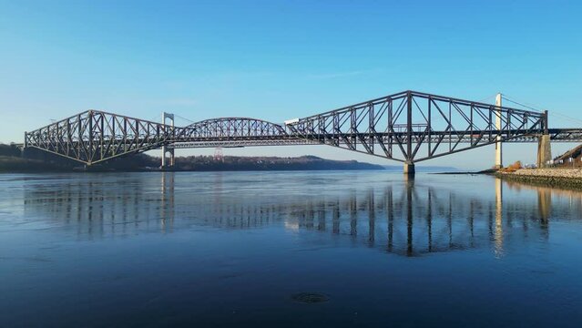 Drone Shot. View of Quebec City old bridges and a fish eating. Summer morning