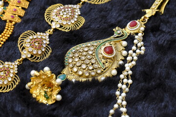 Indian Traditional jewellery displayed in a street shop for sale in Pune, Maharashtra. Indian art, Indian artificial jewelry, Selective Focus.