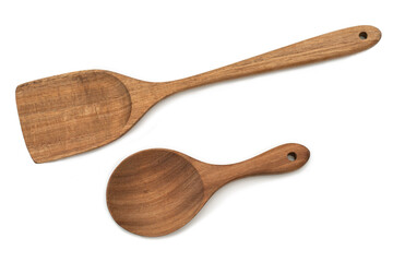 Wooden kitchen spoons on white background