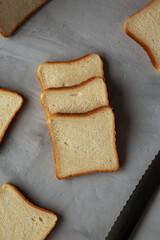Sliced Whole Wheat White Bread on a gray background, top view. Flat lay, overhead, from above.