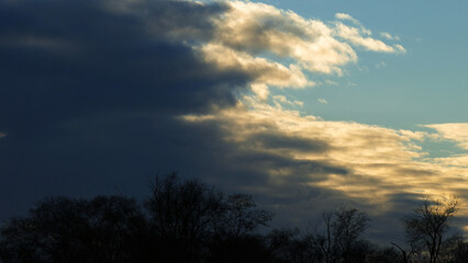 Fototapeta na wymiar Heaven background. Clouds pattern. Sunlight. Contrasting light.