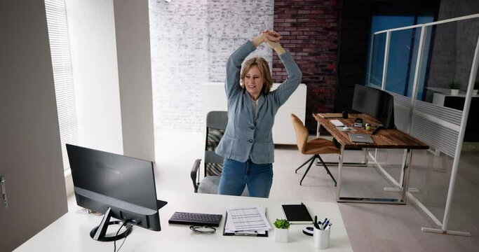 Arms Stretch Exercise Standing Near Desk
