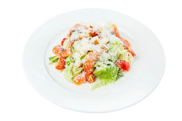 Caesar salad with red fish, tomatoes, lettuce and cheese. Appetizing popular snack. Close-up. Isolated on white background.