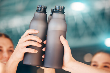 Hands, fitness and cheers with bottle water for team training, exercise or workout achievement in...