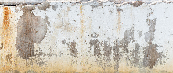 Texture white concrete wall with peeling and crack