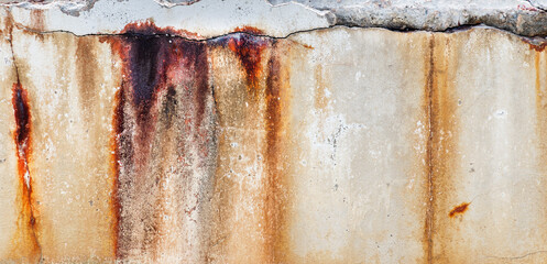 Texture crack concrete wall with rust stains