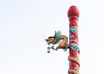 Fototapeta na wymiar Lamp post with dragon in chinese temple