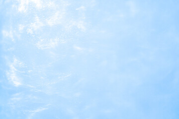 Fototapeta na wymiar gentle blue background with sequins waves liquid motion