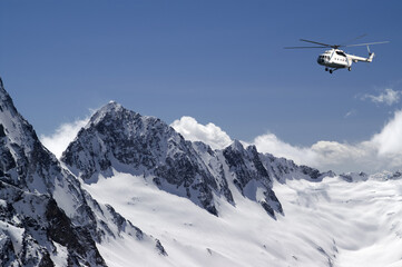 Helicopter in high mountains