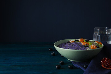 Concept of healthy food with acai smoothie, space for text