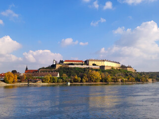 Petrovaradin fortress in colorful autumn colors by the river Danube