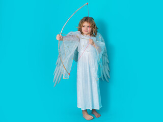 Angel shoots a love arrow from a bow on Valentines Day. Christmas kids. Little cupid angel child...