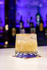Cocktails at the bar of a restaurant. Tasty alcoholic drink.