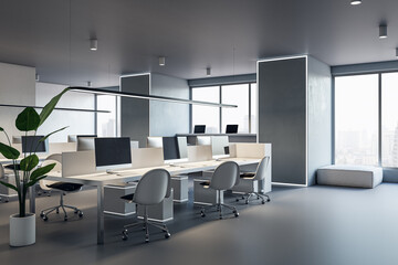 Contemporary concrete coworking office interior with window and city view, daylight, furniture and equipment. 3D Rendering.