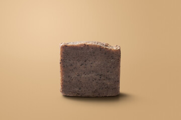 Homemade natural soap on earth tone background