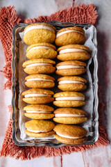 dessert cookies whoopie with cream carrot pumpkin butter cream delicious on orange background