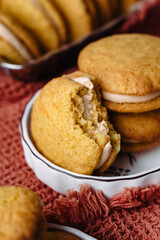 dessert cookies whoopie with cream carrot pumpkin butter cream delicious on orange background