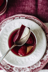 dessert with strawberries fresh mousse pannacotta berry jelly monochrome photo red and white photo sweets on english porcelain retro tableware
