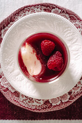 dessert with strawberries fresh mousse pannacotta berry jelly monochrome photo red and white photo sweets on english porcelain retro tableware