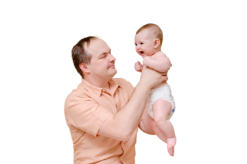 A man father and a boy son play together on the sofa in the home living room, isolated on a white background. Kid aged six months