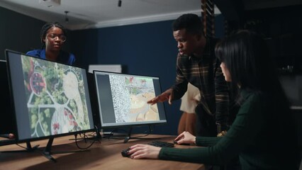 boss is discussing 3D project of landscape design with woman engineer in office, teamwork