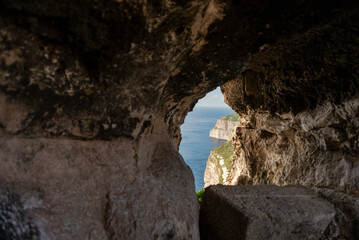 View to cliff from cave in Malta, Gozo