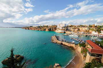 Fototapeta premium Landscape with sea marina and buildings on cliff. Antalya Turkey.