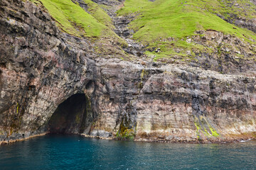 Faroe islands cliffs and caves in Vestmanna area. Streimoy, Denmark