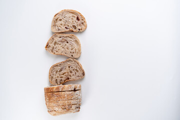 Olive sourdough bread in slice with isolated white background.