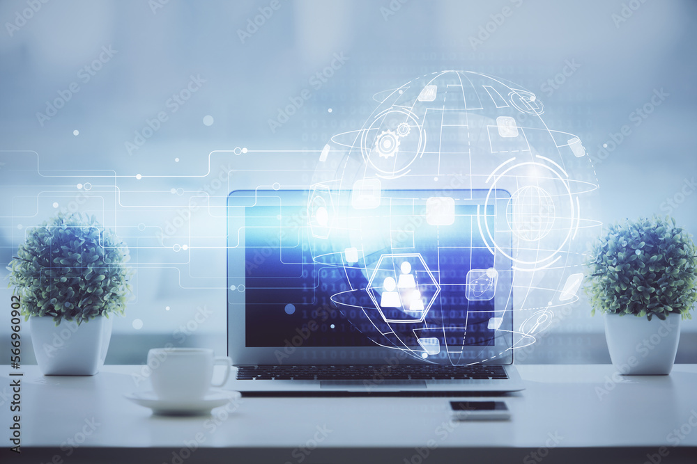 Poster computer on desktop with social network hologram. double exposure. concept of international people c