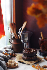 Chocolate donuts in an autumn style still life	