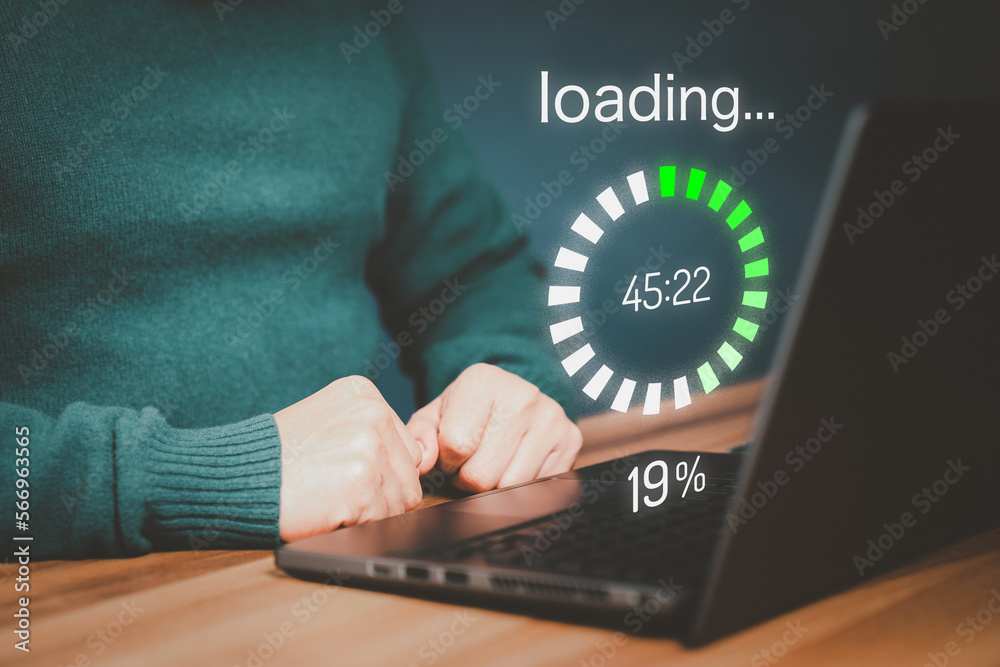 Poster Adult man using a laptop computer for download software and waiting to loading digital business data form website, very slow internet form wifi. Concept of waiting for load of loading symbol.